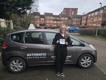 Happy student Jade celebrating passing her driving test with zero minors with EXL Drivers driving school in Rugby.