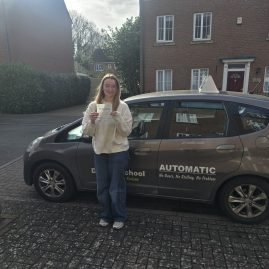 Jade smiling after passing her driving test with zero minors at EXL Drivers driving school in Rugby